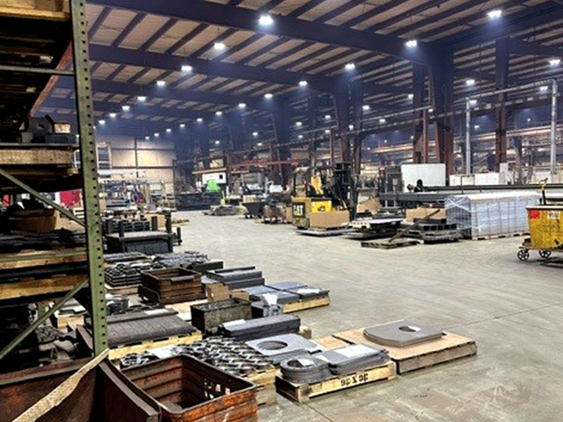 JTV's manufacturing facility warehouse with a focus on LED ceiling light fixtures.